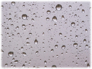 Rain covered window drops sky - a close up of a rain free wallpaper