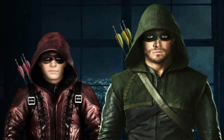 Man woman green arrow costumes - a dark room free wallpaper for desktop