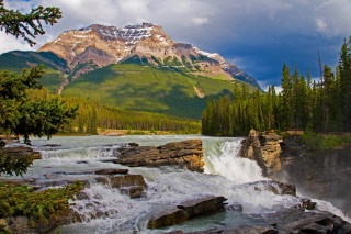 Mountain waterfall trees river nature 2 - a waterfall in the middle of it free wallpaper