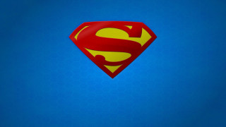 Superman logo blue background yellow 8 - against a blue background free wallpaper