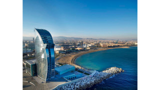 Large building water city beach - panoramic view free wallpaper for desktop