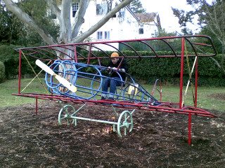 Man playground wheelbarrow baseball bat - an art deco sculpture free wallpaper