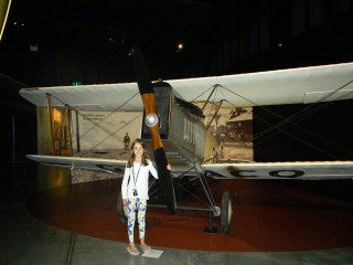 Girl plane night smile hand - her face and a hand free wallpaper