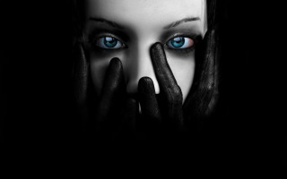 Woman blue eyes black hands - free dark wallpaper for desktop