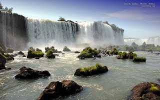 Waterfall large water rocks foreground - a large amount of water free wallpaper