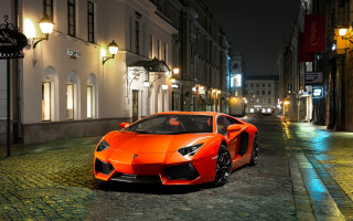 Bright orange sports car cobblestone - orange sports car free wallpaper