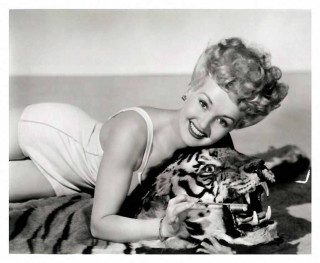 Woman holding stuffed tiger smiling - stuffed free wallpaper