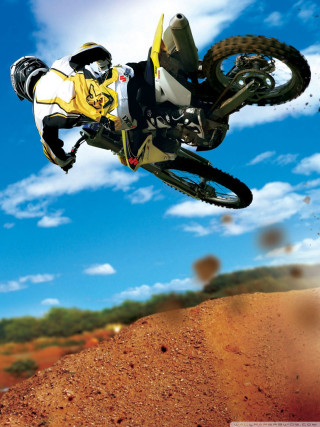 Dirt bike jumping dirt hill - free motorcycles wallpaper for mobile