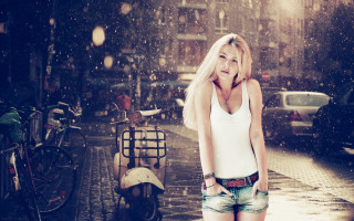 Woman rain bicycle blonde night - a bicycle free wallpaper