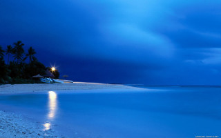 Beach blue sky white sand 2 - a full moon in the distance free wallpaper