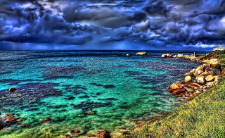 Blue ocean cloudy sky grassy - far free wallpaper