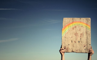 Person holding wooden sign rainbow - vivid color free wallpaper