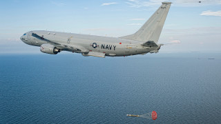 Military plane ocean parachute landing - the bottom of the plane free wallpaper