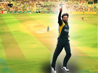 Man green yellow uniform holding - a crowd free wallpaper
