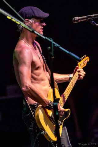 Shirtless man playing guitar singing - david boyd free wallpaper for mobile