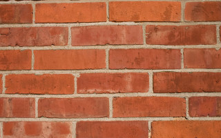 Close up brick wall red - texture free wallpaper