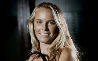 Woman holding tennis racket smiling - christen købke free wallpaper