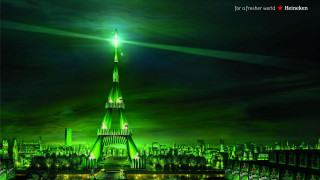 Green lit building night city - a city in the background free wallpaper for desktop