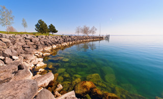Water rocks dock grassy area - a grassy area free wallpaper