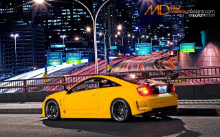 Yellow sports car night road 2 - city free wallpaper