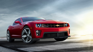 Red chevrolet camaro driving road - photorealism free wallpaper for desktop