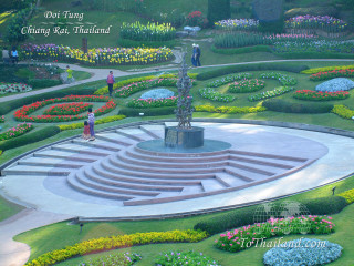 Garden fountain flowers people walking - a fountain free wallpaper for desktop