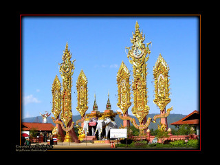 Golden statues building clock blue - ornamental free wallpaper