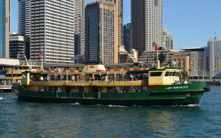 Large green yellow boat city - tall building free wallpaper