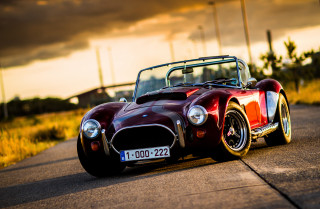 Red sports car sunset cloudy 5 - refined free wallpaper