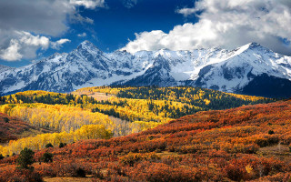 Mountain range snow capped autumn - white cloud free wallpaper