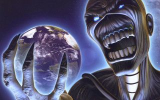 Man holding globe creepy face - a globe free wallpaper