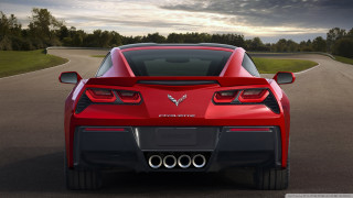 Red sports car driving forest 4 - back view free wallpaper