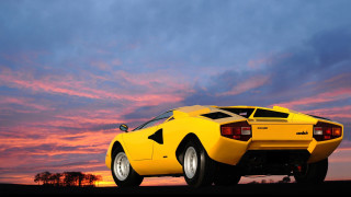 Yellow sports car field sunset - a yellow sports car free wallpaper