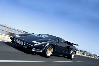 Black sports car road tall - 1 9 7 0 s free wallpaper