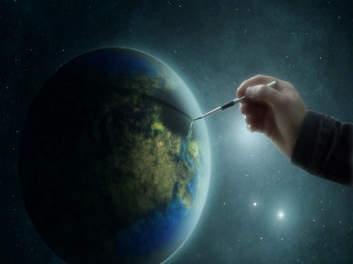 Hand holding paintbrush planet stars - a hand holding free wallpaper