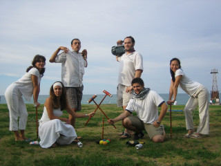 Group people posing picture field - their hand free wallpaper