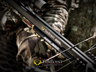 Man holding bow hunting outfit - ben thompson free wallpaper