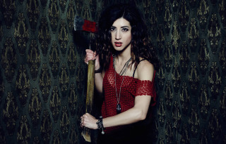 Woman large axe red top - a woman holding free wallpaper for desktop