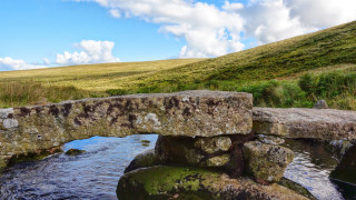 Stone bridge stream grassy hill - a hill in the background free wallpaper