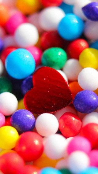 Heart candy closeup bokeh shiny - free hearts wallpaper for mobile