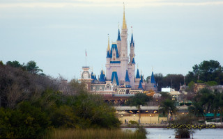 Castle towers trees water scenery - free ship wallpaper for desktop