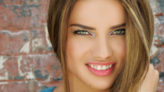 Woman green eyes brick wall - her cheek free wallpaper