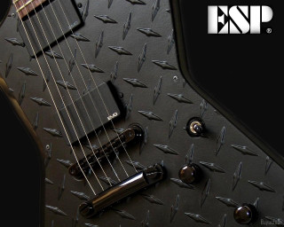 Close up black guitar picker - eric peterson free wallpaper