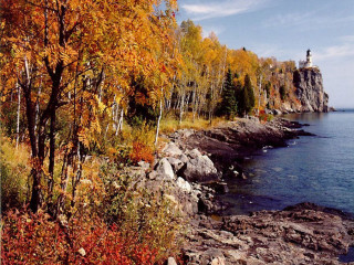 Lighthouse rocky shore autumn impressionist - a lighthouse free wallpaper