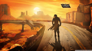 Man walking desert sunset bridge 2 - dean roger free wallpaper