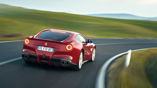 Red sports car driving hills - hill free wallpaper