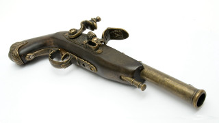 Brass colored gun metal handle - the side of it free wallpaper