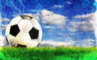 Soccer ball green field blue 2 - a soccer ball free wallpaper for desktop