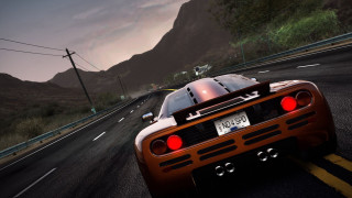 Red car mountain road speed - motion blur free wallpaper