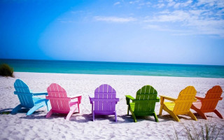 Colorful chairs sandy beach ocean 2 - a sandy beach next free wallpaper for desktop